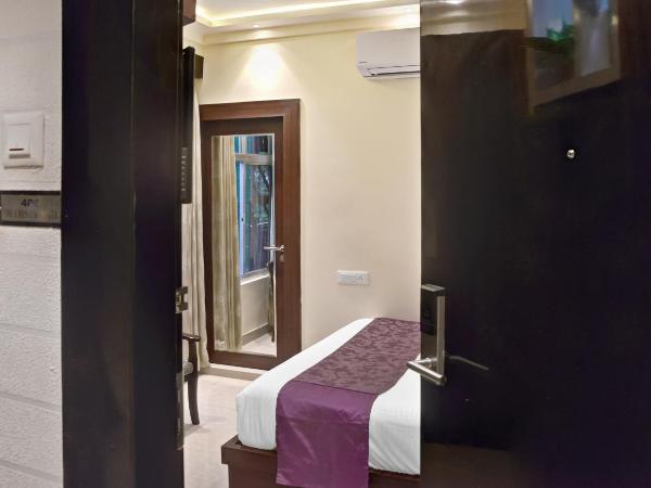 Treebo Premium The Crystal : photo 5 de la chambre chambre simple Économique