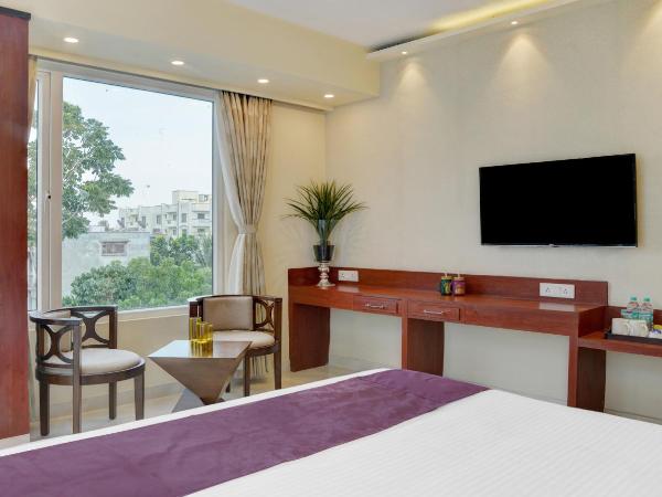 Treebo Premium The Crystal : photo 3 de la chambre chambre double deluxe