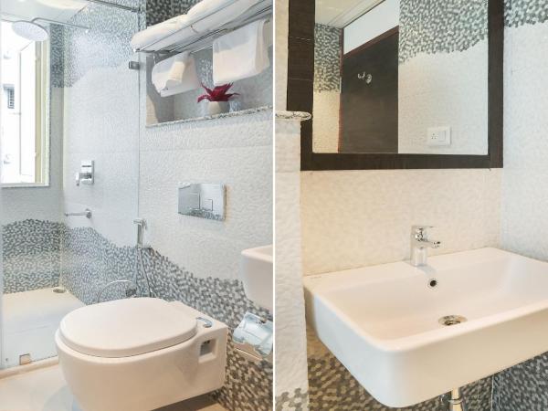 Treebo Premium The Crystal : photo 6 de la chambre chambre double deluxe