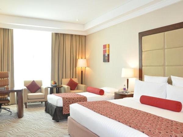 Park Regis Kris Kin Hotel : photo 1 de la chambre chambre triple deluxe