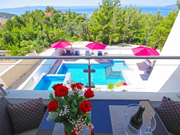 Villa Inis : photo 5 de la chambre suite lit queen-size – vue sur mer