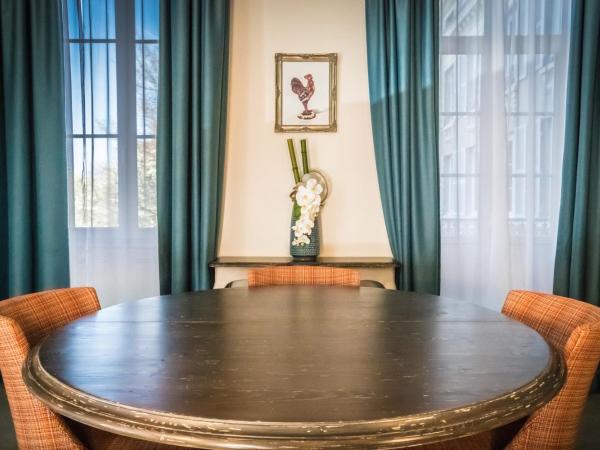 Best Western Hôtel de France : photo 5 de la chambre suite lit queen-size