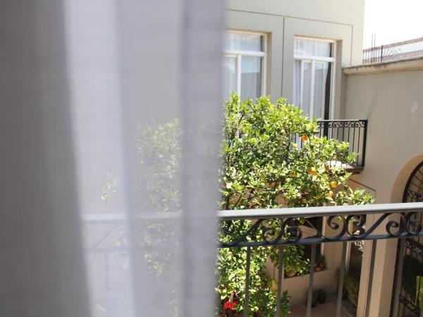 Hotel Mamá Carlota : photo 6 de la chambre chambre lit king-size deluxe