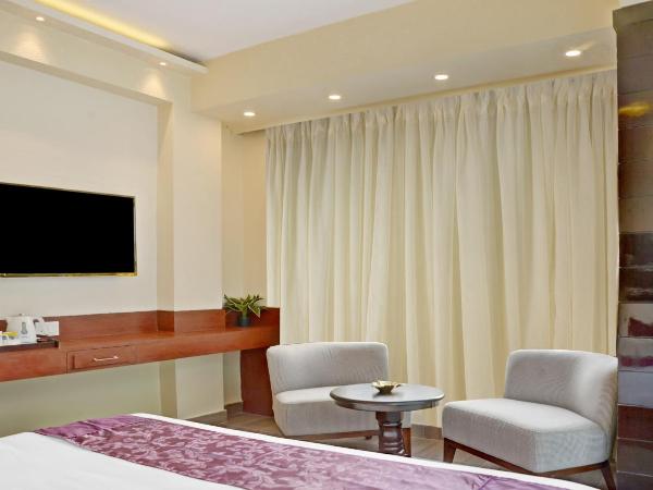 Treebo Premium The Crystal : photo 6 de la chambre chambre double supérieure [assainie]