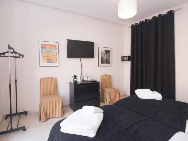 Bet Apartments - Canovas rooms : photo 7 de la chambre chambre lits jumeaux