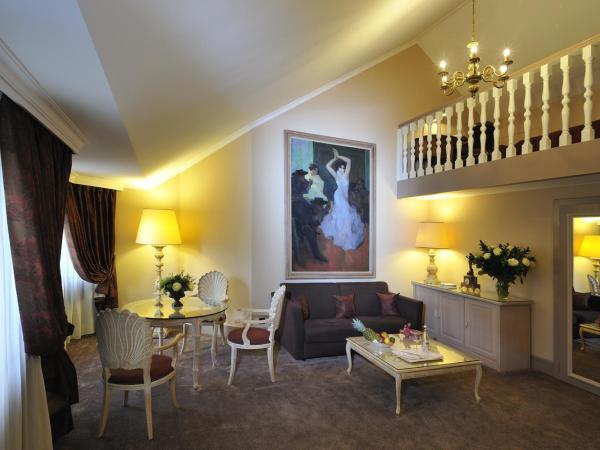 Hôtel de la Cigogne : photo 1 de la chambre suite duplex supérieure