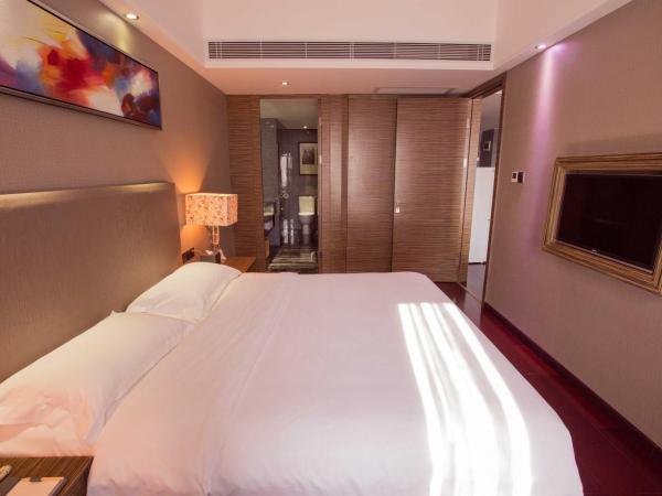 La Perle International Hotel - Free shuttle between hotel and Exhibition Center during Canton Fair & Exhibitor registration Counter : photo 3 de la chambre suite familiale deluxe