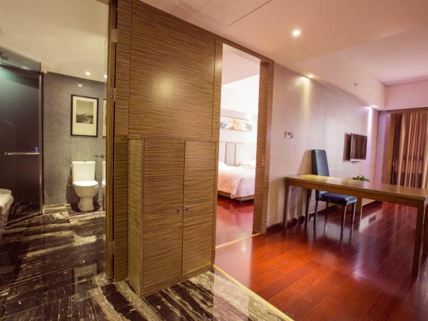 La Perle International Hotel - Free shuttle between hotel and Exhibition Center during Canton Fair & Exhibitor registration Counter : photo 7 de la chambre suite exécutive