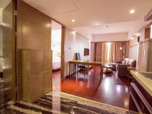 La Perle International Hotel - Free shuttle between hotel and Exhibition Center during Canton Fair & Exhibitor registration Counter : photo 6 de la chambre suite familiale deluxe