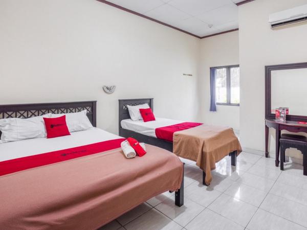 RedDoorz near XT Square 2 : photo 1 de la chambre chambre familiale