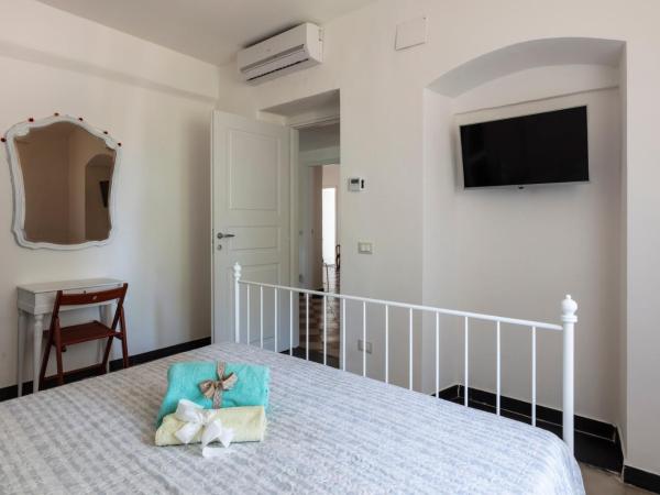 La BRIGNA B&B Il bosco sul mare : photo 5 de la chambre chambre lit queen-size avec salle de bains commune