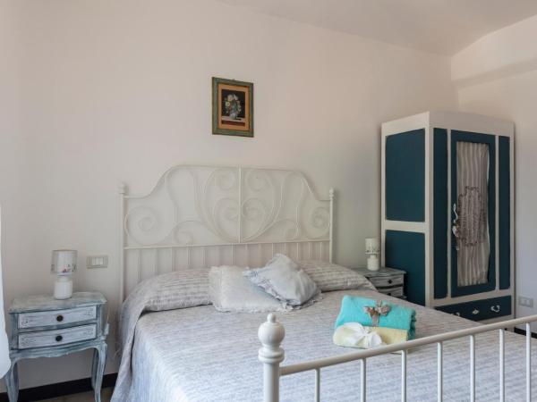 La BRIGNA B&B Il bosco sul mare : photo 2 de la chambre chambre lit queen-size avec salle de bains commune