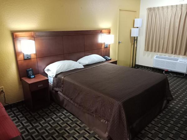 Budget Inn Of Orlando : photo 4 de la chambre chambre standard lit queen-size