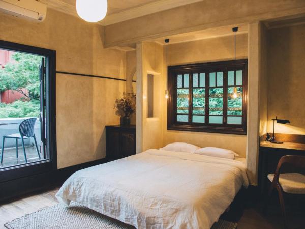 Guesthouse toco : photo 2 de la chambre chambre lit queen-size avec balcon