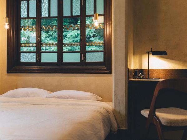 Guesthouse toco : photo 4 de la chambre chambre lit queen-size avec balcon