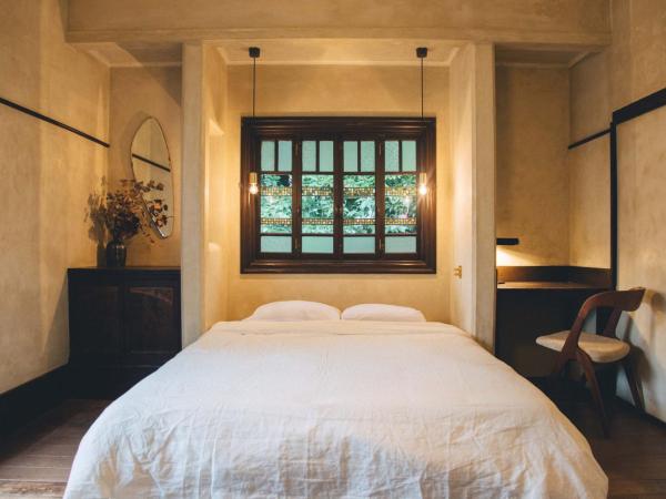 Guesthouse toco : photo 7 de la chambre chambre lit queen-size avec balcon