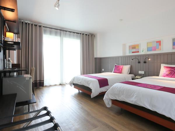 The Mantrini Chiang Rai-SHA Extra Plus : photo 3 de la chambre chambre lits jumeaux deluxe avec balcon
