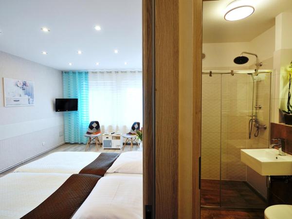 Sanatorium Willa Fortuna : photo 3 de la chambre chambre triple confort