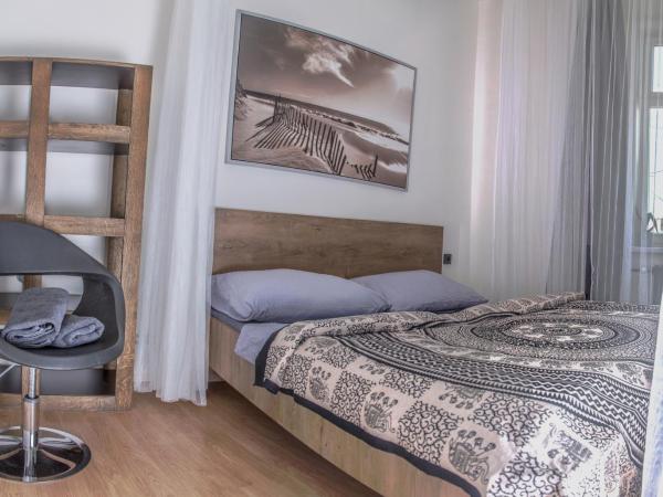 Wake Up Wellness Hostel : photo 1 de la chambre chambre double avec salle de bains commune