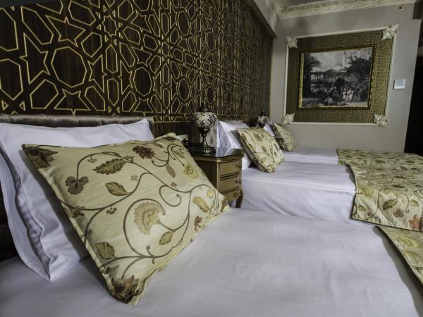 Empire Suite Hotel : photo 8 de la chambre chambre triple deluxe - vue sur mer