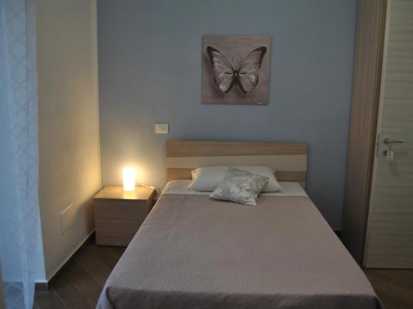 La Triade affittacamere : photo 6 de la chambre chambre simple avec salle de bains privative