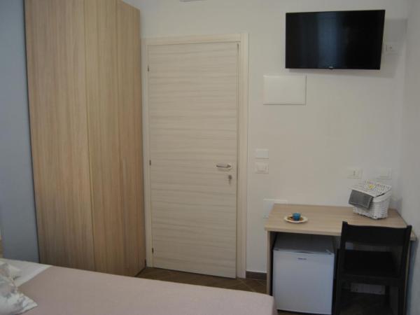 La Triade affittacamere : photo 4 de la chambre chambre simple avec salle de bains privative