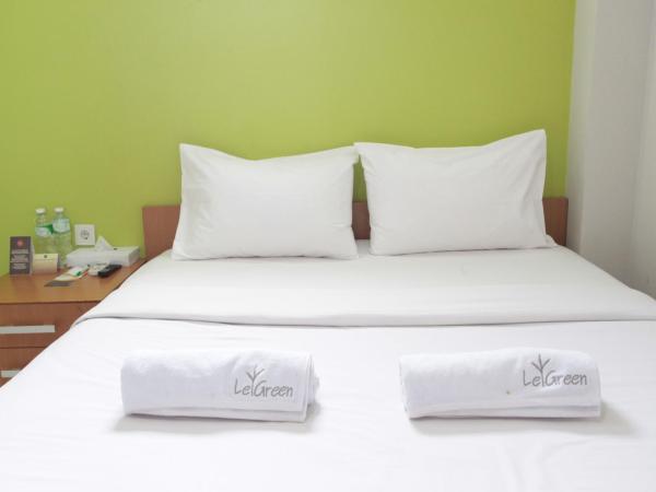 LeGreen Suite Tebet : photo 1 de la chambre chambre double standard