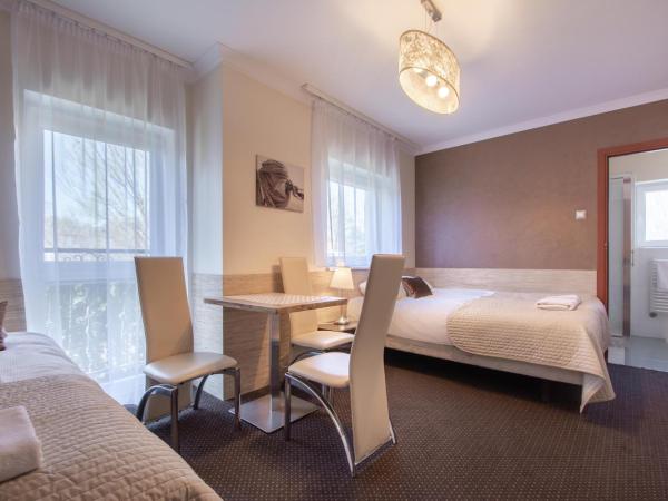 Villa 33 Blisko Plaży : photo 1 de la chambre chambre triple