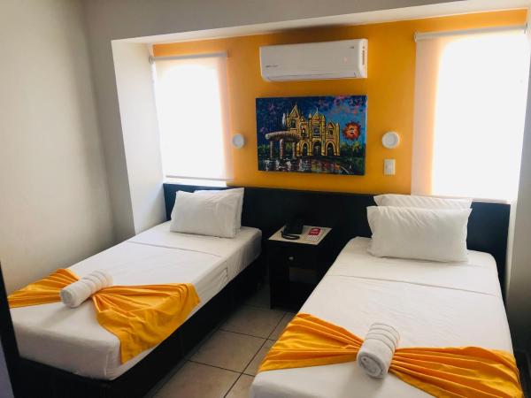 Hotel Belisario INN : photo 3 de la chambre chambre lits jumeaux standard