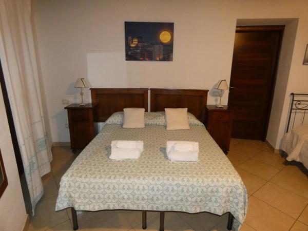 L'Antica Torre Caralis Holiday : photo 7 de la chambre grande chambre double ou lits jumeaux