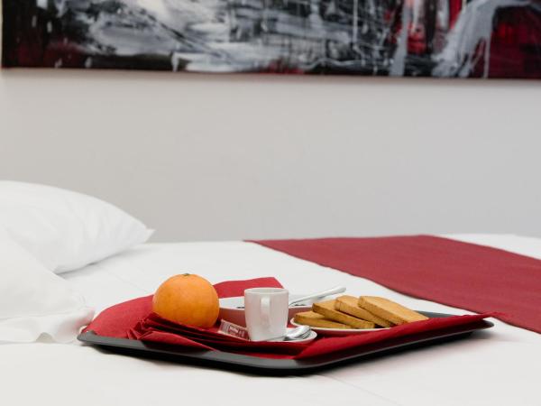 Genova46 Suites & Rooms : photo 1 de la chambre chambre deluxe double ou lits jumeaux