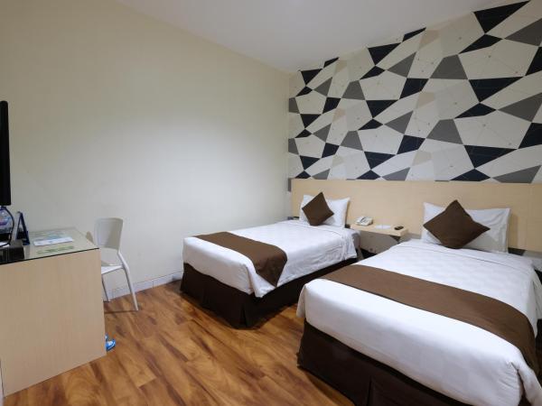 Hotel 88 Mangga Besar Raya 120 Jakarta By WH : photo 1 de la chambre chambre lits jumeaux supérieure