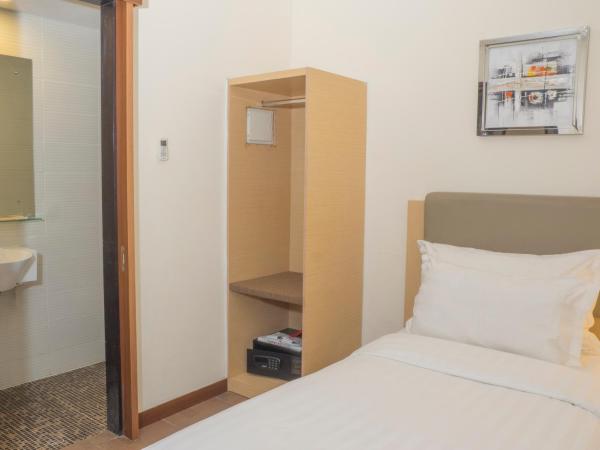 d'primahotel Melawai - Blok M : photo 3 de la chambre chambre simple standard