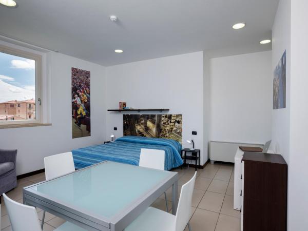 Porta Pispini Residence : photo 9 de la chambre studio deluxe