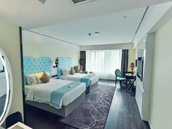 Xana Hotelle Shenzhen Airport Terminal : photo 4 de la chambre chambre lits jumeaux deluxe