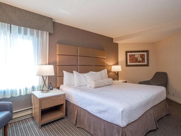 Best Western Premier Chateau Granville Hotel & Suites & Conference Centre : photo 1 de la chambre suite lit king-size avec balcon et canapé-lit - non-fumeurs