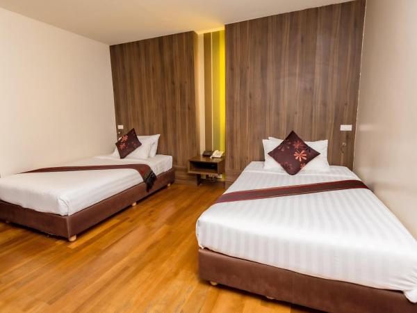 Bally Suite Silom : photo 5 de la chambre chambre deluxe double ou lits jumeaux