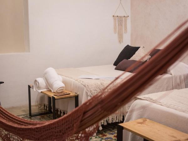 Kuka y Naranjo : photo 1 de la chambre chambre lits jumeaux