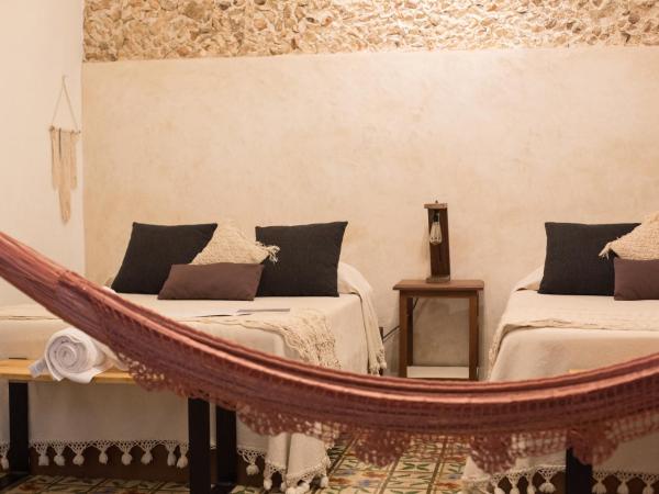 Kuka y Naranjo : photo 2 de la chambre chambre lits jumeaux