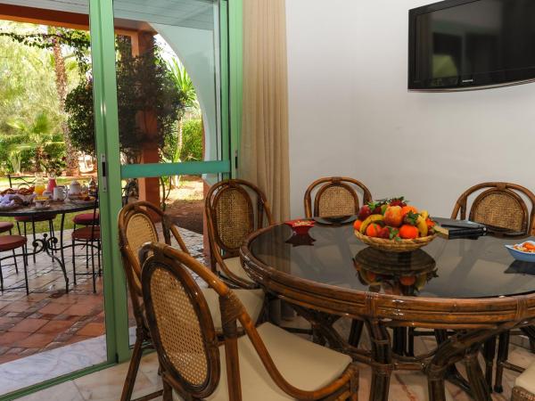 In Club Palmeraie Resorts : photo 10 de la chambre appartement - vue sur jardin