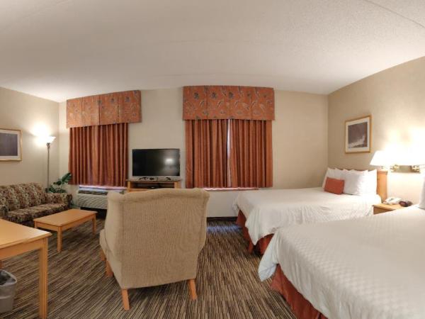 Humphry Inn and Suites : photo 2 de la chambre suite lit queen-size