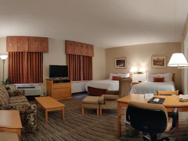 Humphry Inn and Suites : photo 5 de la chambre suite lit queen-size