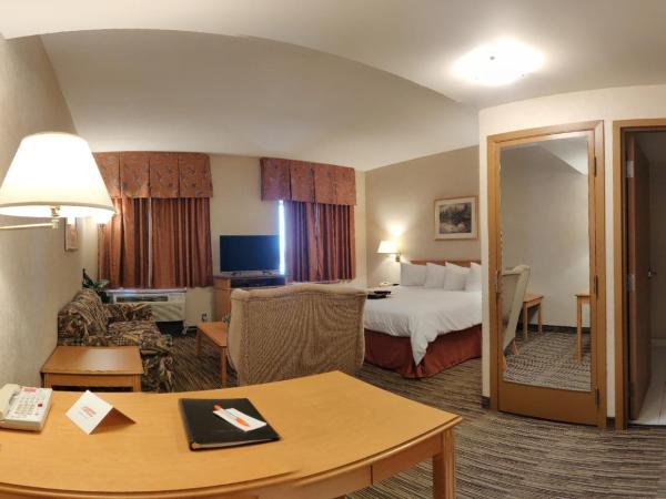 Humphry Inn and Suites : photo 4 de la chambre suite lit king-size