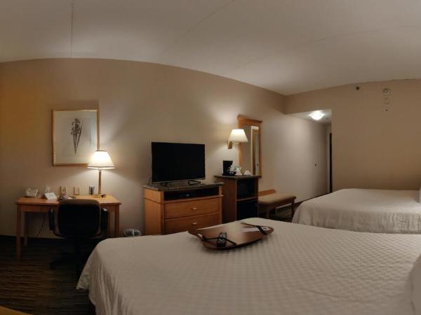Humphry Inn and Suites : photo 1 de la chambre chambre lit queen-size