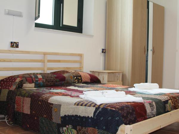 Beteyà Hostel Don Bosco : photo 9 de la chambre chambre triple deluxe - vue sur mer