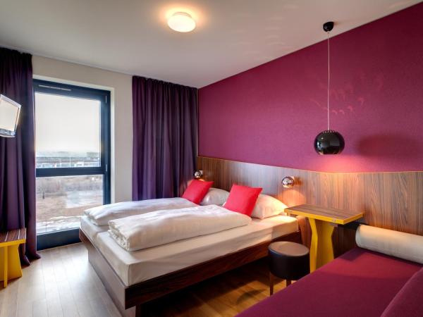 MEININGER Hotel Frankfurt Main / Airport : photo 1 de la chambre chambre triple