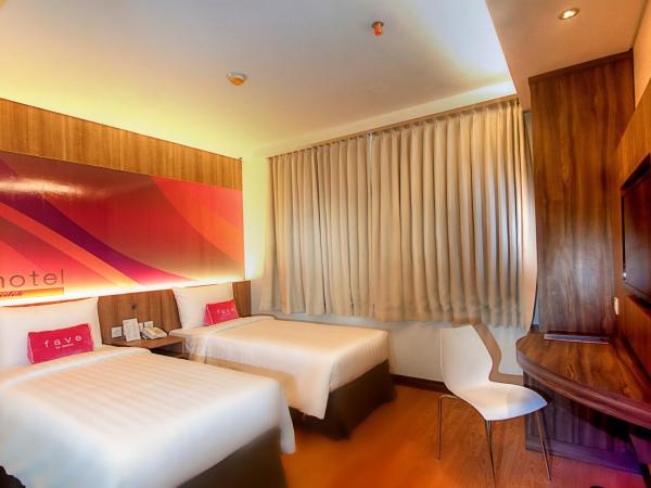 favehotel LTC Glodok : photo 1 de la chambre chambre double ou lits jumeaux standard