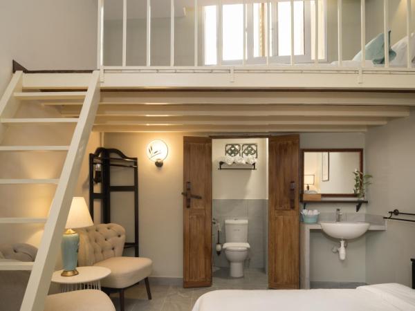 Carnarvon House : photo 2 de la chambre chambre triple avec salle de bains privative