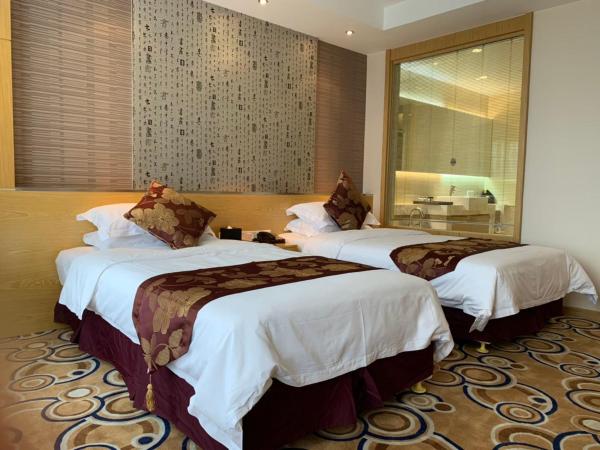 Suzhou Sun Plaza Hotel : photo 3 de la chambre chambre lits jumeaux standard