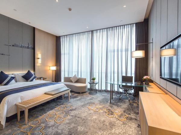 Chongqing Liyuan Hotel : photo 7 de la chambre chambre lit king-size exécutive